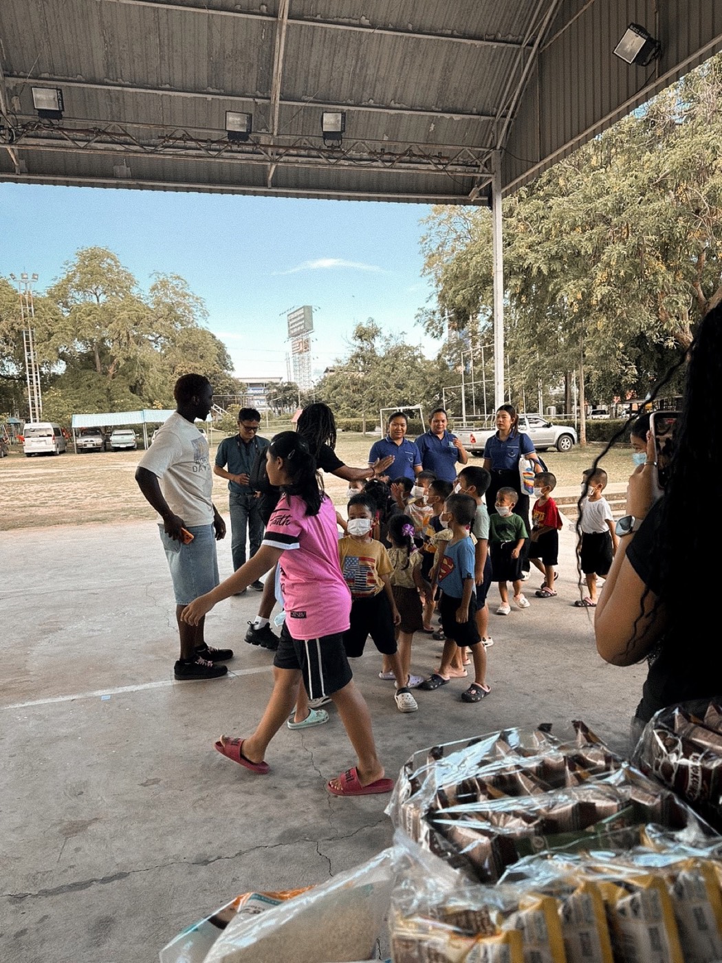 Zion Fajemilugba with children during an orphanage visit in Pattaya, Thailand